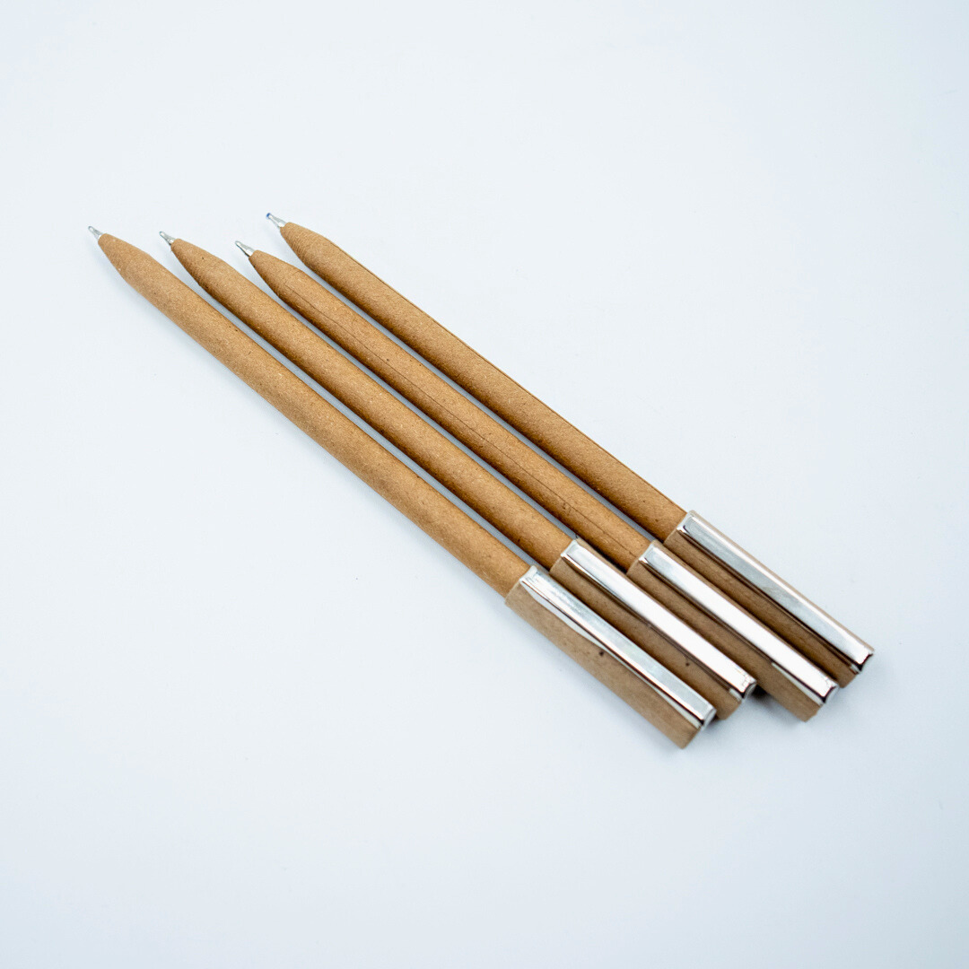 Plastic-free ball pen with recycled paper barrel and durable metal clip. Smooth everyday writing, eco-friendly choice. Available in multipacks.