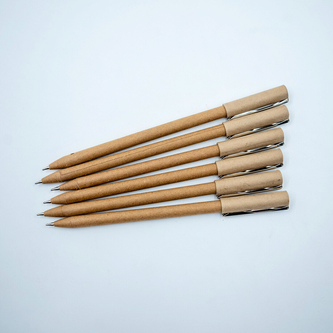 Plastic-free ball pen with recycled paper barrel and durable metal clip. Smooth everyday writing, eco-friendly choice. Available in multipacks.