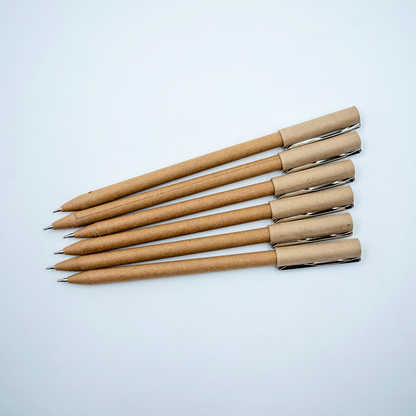 Plastic-free ball pen with recycled paper barrel and durable metal clip. Smooth everyday writing, eco-friendly choice. Available in multipacks.