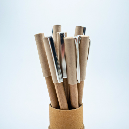 Plastic-free ball pen with recycled paper barrel and durable metal clip. Smooth everyday writing, eco-friendly choice. Available in multipacks.